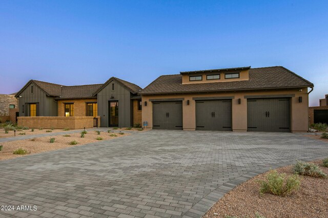 view of front of home with a garage