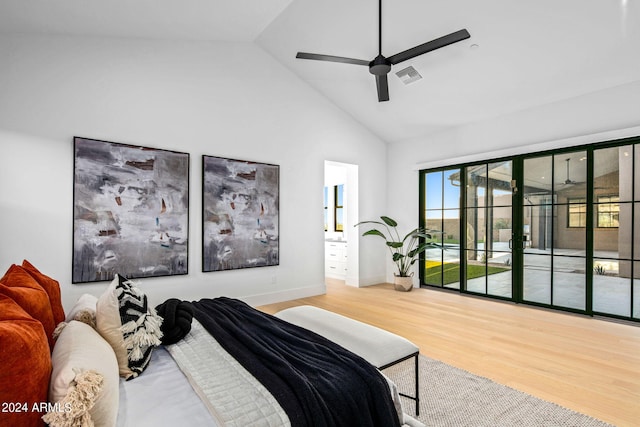 bedroom with ceiling fan, hardwood / wood-style flooring, ensuite bath, and access to exterior