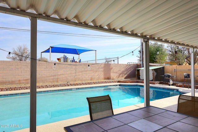 view of pool with a patio