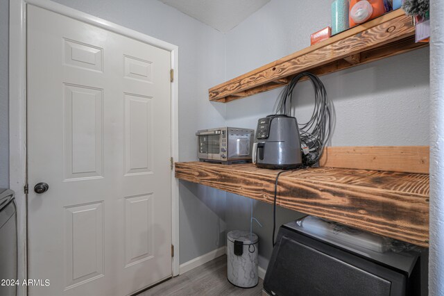 interior space with hardwood / wood-style flooring