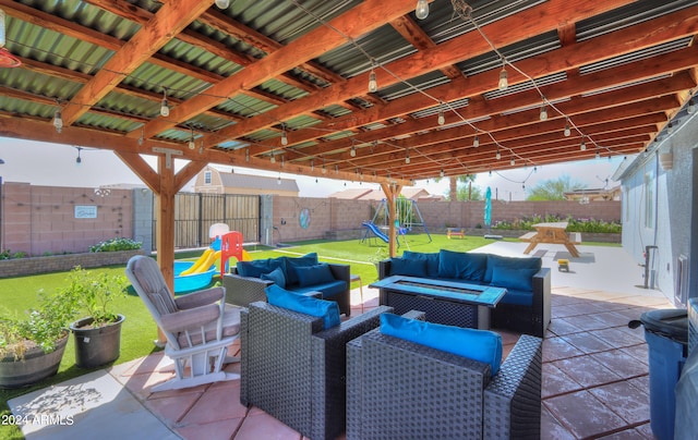 view of patio / terrace featuring a playground and an outdoor hangout area