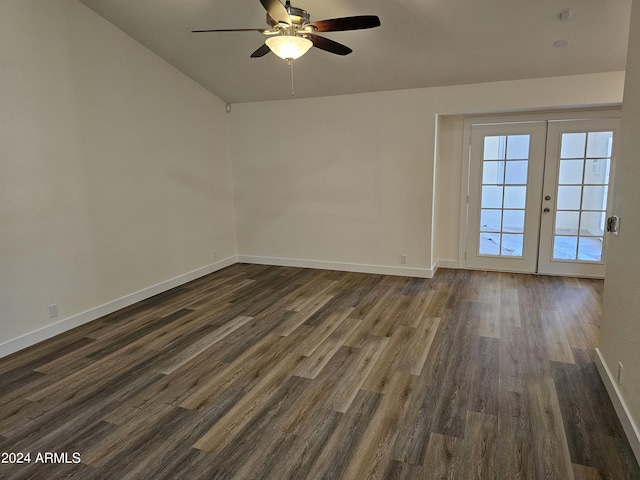 unfurnished room featuring ceiling fan, dark wood-type flooring, lofted ceiling, and french doors