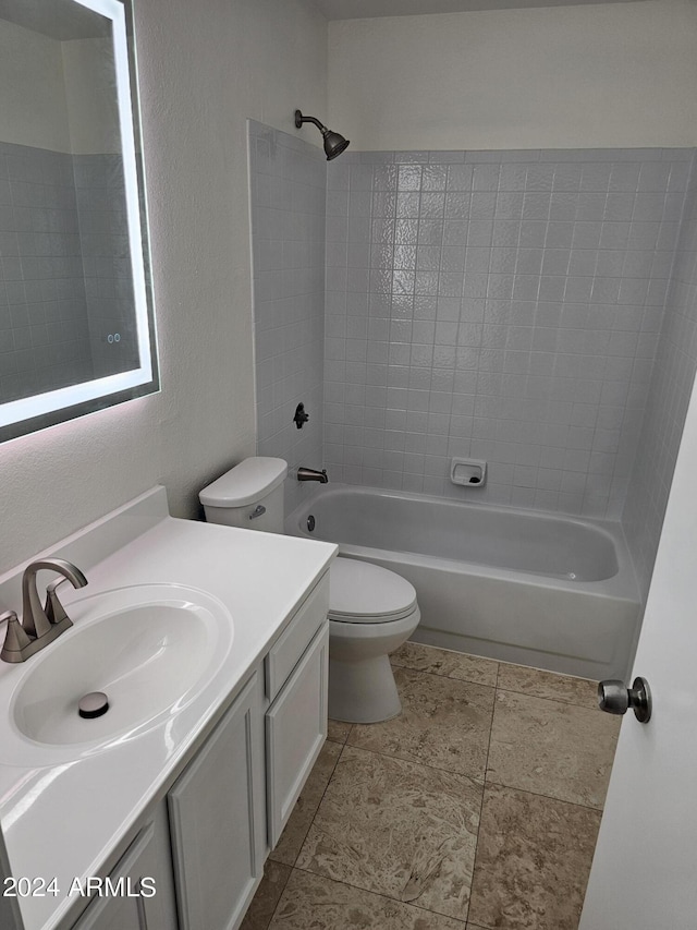 full bathroom with toilet, vanity, and bathtub / shower combination