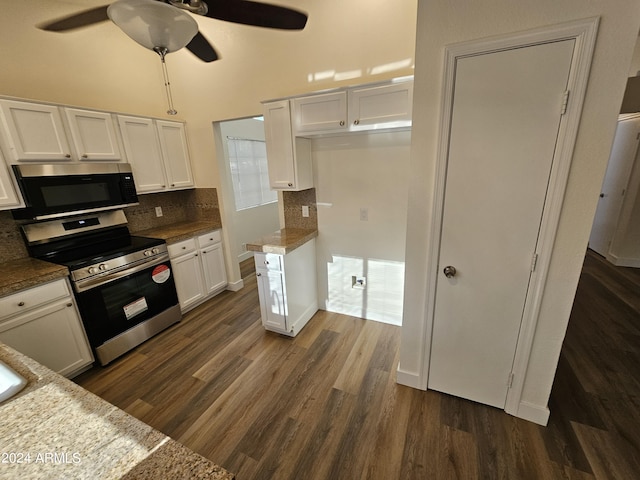 kitchen with ceiling fan, electric range, white cabinets, and dark hardwood / wood-style flooring