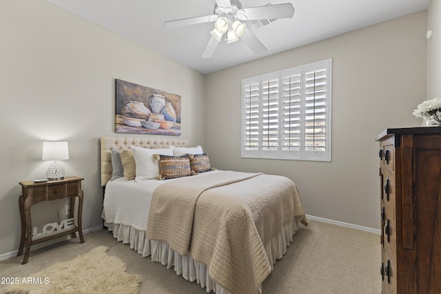 6213 W Gambit Trl, Phoenix, AZ 85083 - bedroom with baseboards, light carpet, and a ceiling fan
