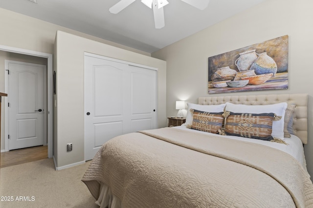 6213 W Gambit Trl, Phoenix, AZ 85083 - bedroom with a closet, light carpet, baseboards, and a ceiling fan