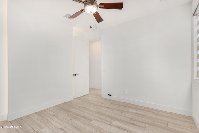 unfurnished room featuring ceiling fan and light hardwood / wood-style floors