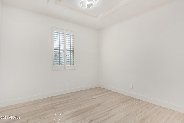 empty room with light hardwood / wood-style floors