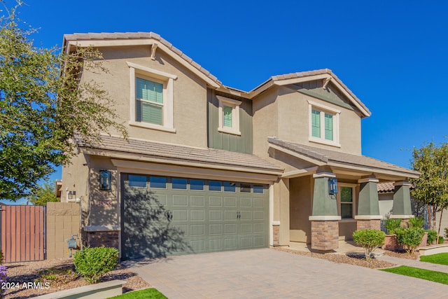 view of front of property featuring a garage