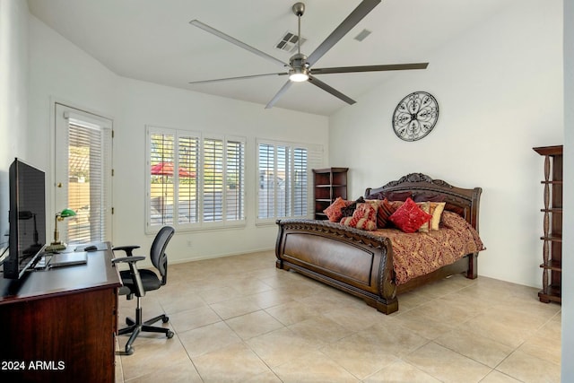 bedroom with ceiling fan, light tile patterned floors, and vaulted ceiling