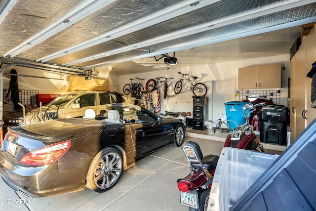 garage featuring a garage door opener