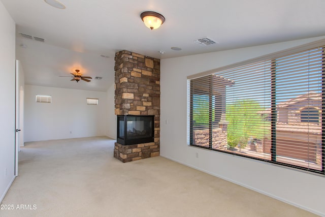 3030 N Saranac, Mesa, AZ 85207 - unfurnished living room featuring a fireplace, carpet floors, a ceiling fan, and lofted ceiling