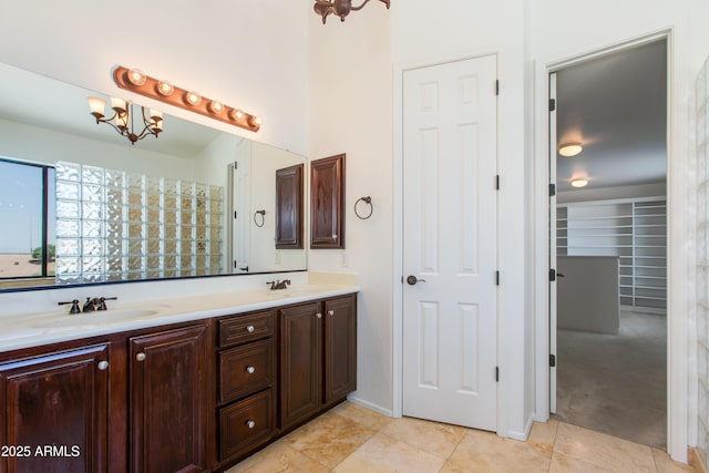 3030 N Saranac, Mesa, AZ 85207 - full bathroom featuring double vanity, a chandelier, tile patterned flooring, and a closet