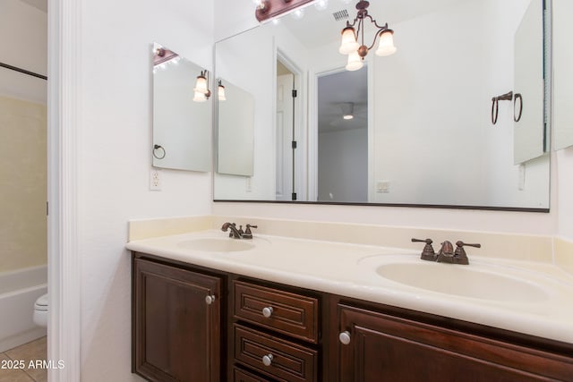 3030 N Saranac, Mesa, AZ 85207 - bathroom featuring double vanity and toilet