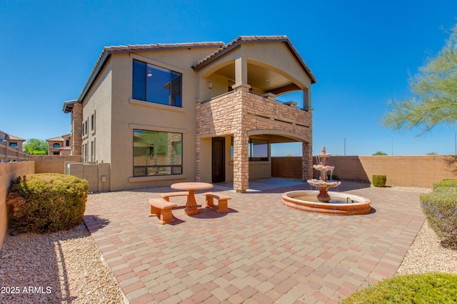 3030 N Saranac, Mesa, AZ 85207 - rear view of property with a balcony, a patio, stucco siding, and a fenced backyard