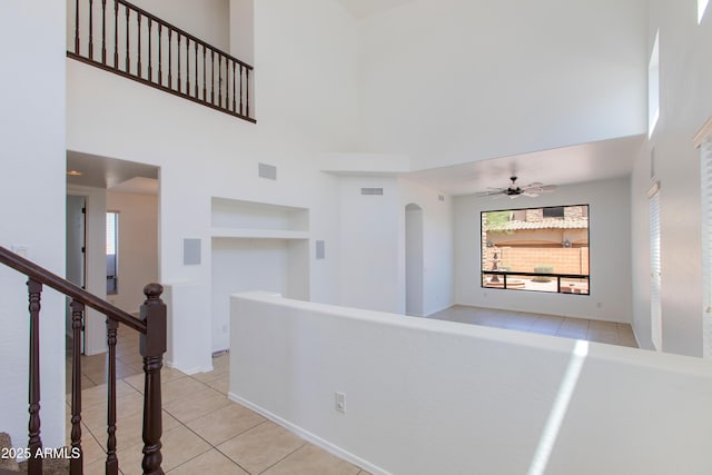 3030 N Saranac, Mesa, AZ 85207 - hallway with a high ceiling, tile patterned floors, healthy amount of natural light, and built in shelves
