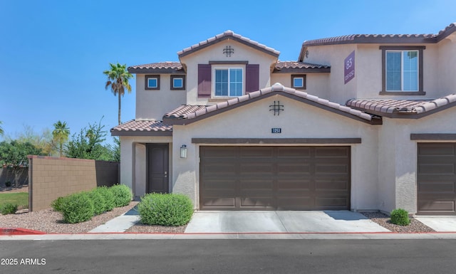 1255 N Arizona Ave Unit 1251, Chandler, AZ 85225 - mediterranean / spanish-style house with a tiled roof, stucco siding, and driveway