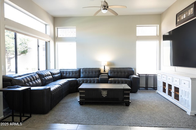 living room featuring ceiling fan