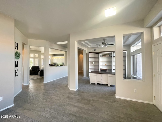 entryway with ceiling fan and dark hardwood / wood-style floors