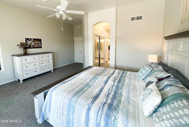 carpeted bedroom with ceiling fan and lofted ceiling