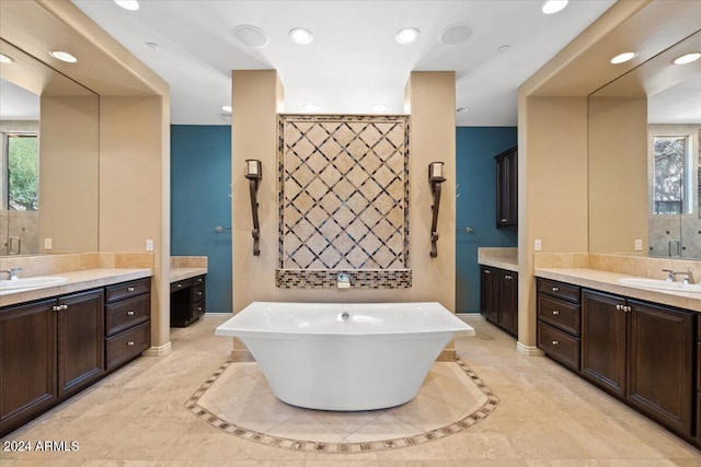 bathroom featuring double vanity and tile patterned flooring