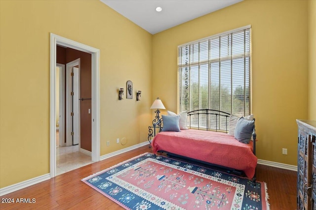 bedroom featuring wood-type flooring