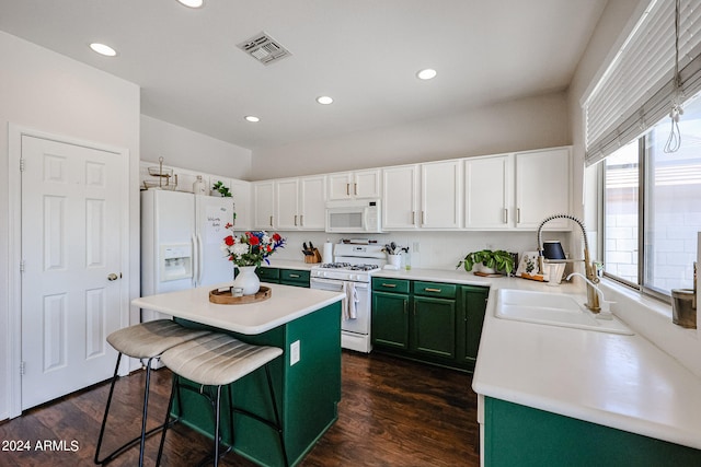 kitchen featuring white appliances, white cabinets, dark wood-type flooring, and green cabinets