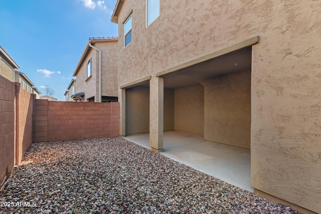 view of yard featuring a patio area and fence