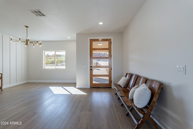 3909 S Veronica Ln, Gold Canyon, AZ 85118 - interior space with a chandelier, plenty of natural light, visible vents, and wood finished floors