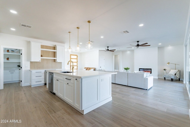 3909 S Veronica Ln, Gold Canyon, AZ 85118 - kitchen featuring white cabinetry, open shelves, visible vents, dishwasher, and a sink
