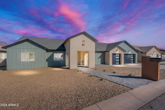 3909 S Veronica Ln, Gold Canyon, AZ 85118 - single story home featuring board and batten siding, a shingled roof, a garage, and concrete driveway