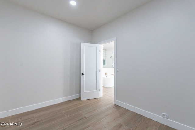 3909 S Veronica Ln, Gold Canyon, AZ 85118 - empty room with baseboards and light wood-type flooring