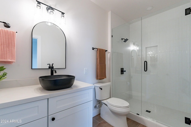 3909 S Veronica Ln, Gold Canyon, AZ 85118 - bathroom featuring a shower stall, vanity, toilet, and wood finished floors