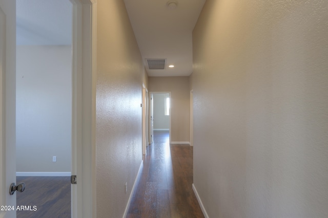 hall featuring dark hardwood / wood-style flooring