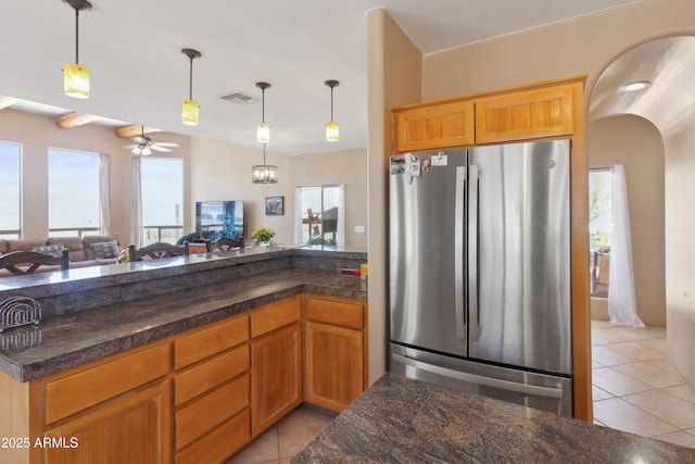 40834 N 26th St, Cave Creek, AZ 85331 - kitchen with freestanding refrigerator, light tile patterned flooring, open floor plan, and a ceiling fan