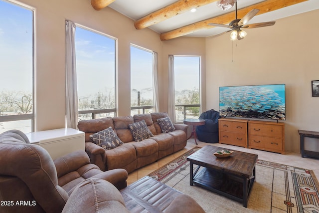 40834 N 26th St, Cave Creek, AZ 85331 - living room featuring light tile patterned floors, beam ceiling, and ceiling fan