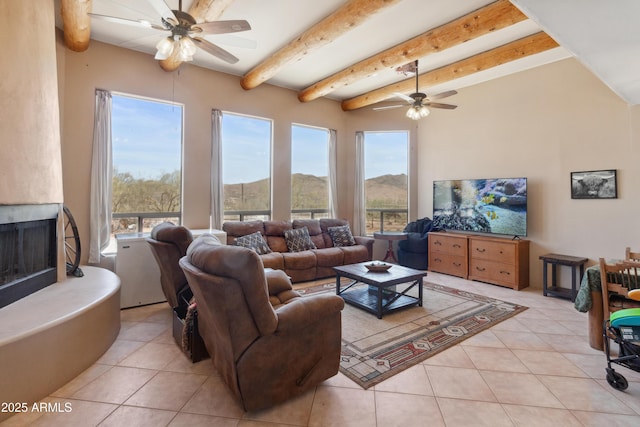 40834 N 26th St, Cave Creek, AZ 85331 - living area featuring ceiling fan, light tile patterned floors, and beam ceiling