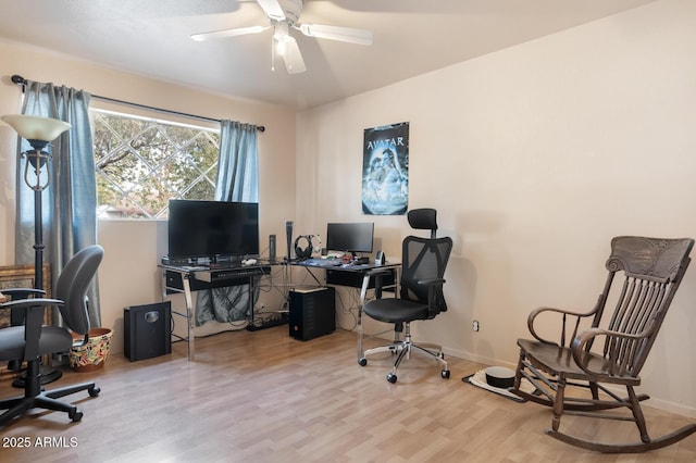 office featuring hardwood / wood-style floors and ceiling fan