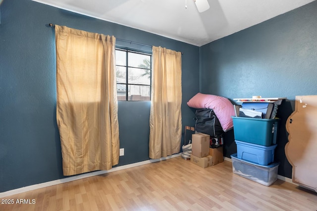 interior space featuring ceiling fan