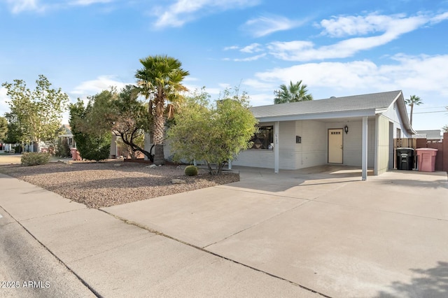 view of front of home with a carport