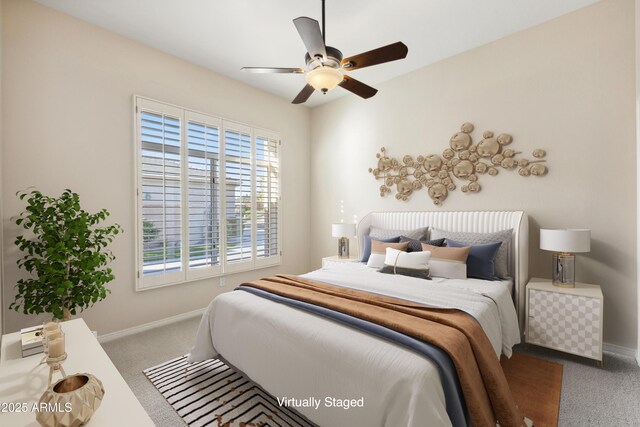 9475 N 115th Pl, Scottsdale, AZ 85259 - carpeted bedroom featuring multiple windows, baseboards, and ceiling fan