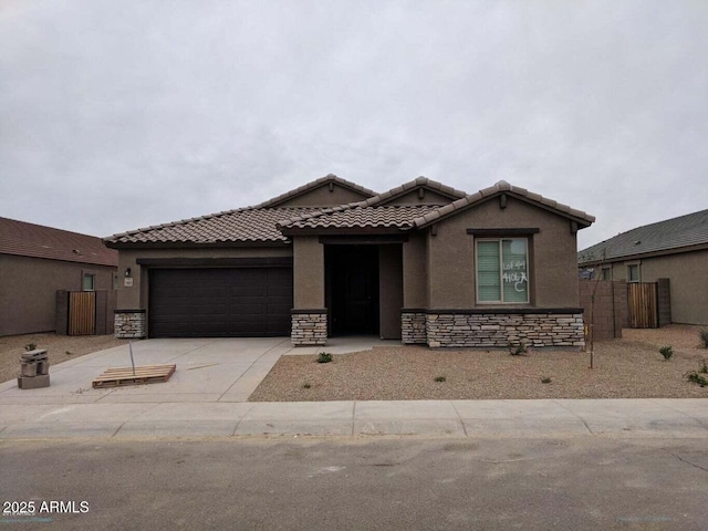 view of front of property featuring a garage