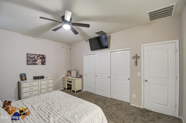 bedroom featuring a closet, ceiling fan, and dark colored carpet