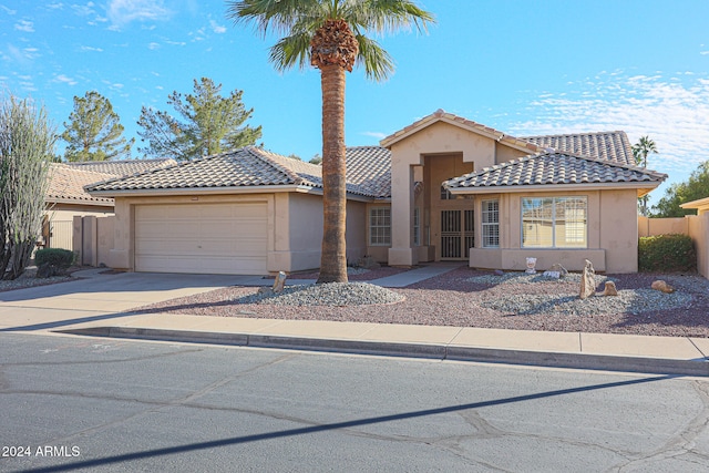 view of front of home with a garage