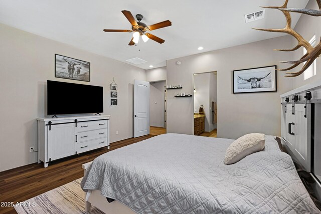 1008 E Mano Dr, New River, AZ 85087 - bedroom with wood finished floors, recessed lighting, a ceiling fan, and ensuite bath