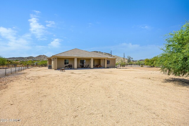 1008 E Mano Dr, New River, AZ 85087 - back of property with a patio area and stucco siding