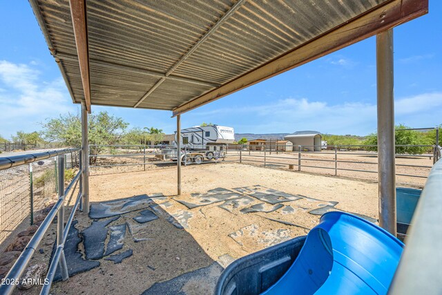 1008 E Mano Dr, New River, AZ 85087 - view of patio with an exterior structure and an outbuilding