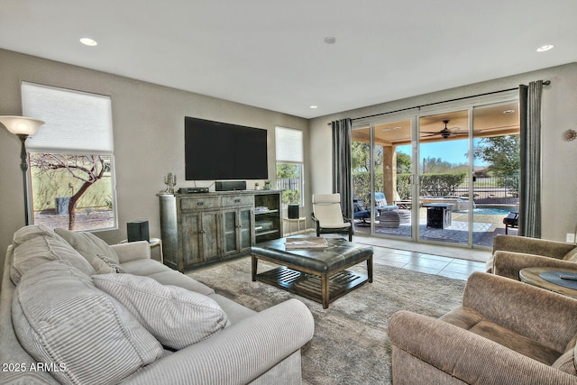 living room featuring recessed lighting and tile patterned floors