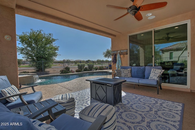 view of patio featuring outdoor lounge area, a fenced backyard, a ceiling fan, and a fenced in pool