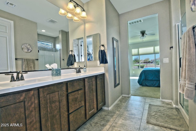 ensuite bathroom featuring ensuite bathroom, a sink, and visible vents